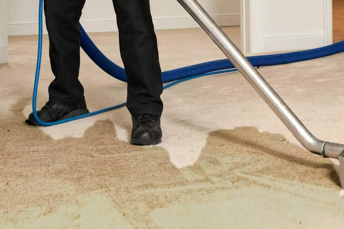 Water extraction from a soaked carpet in a Brooklyn home